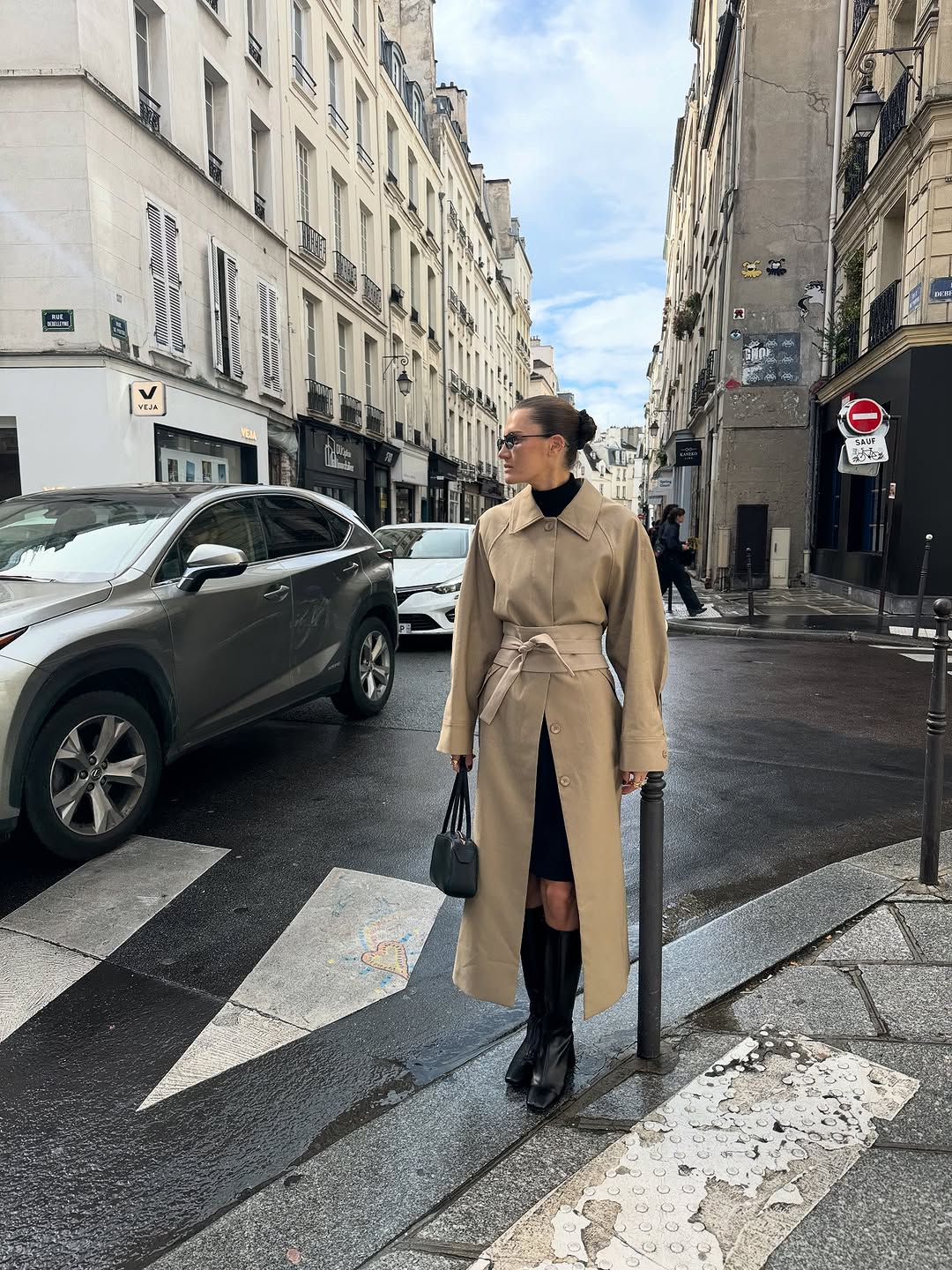 woman wearing black turtleneck outfit fall 2025