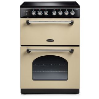 A cream slimline range oven with traditional dials