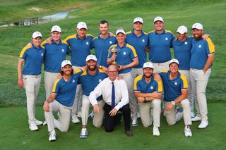 Guy Kinnings poses with Team Europe's Ryder Cup dozen at Marco Simone