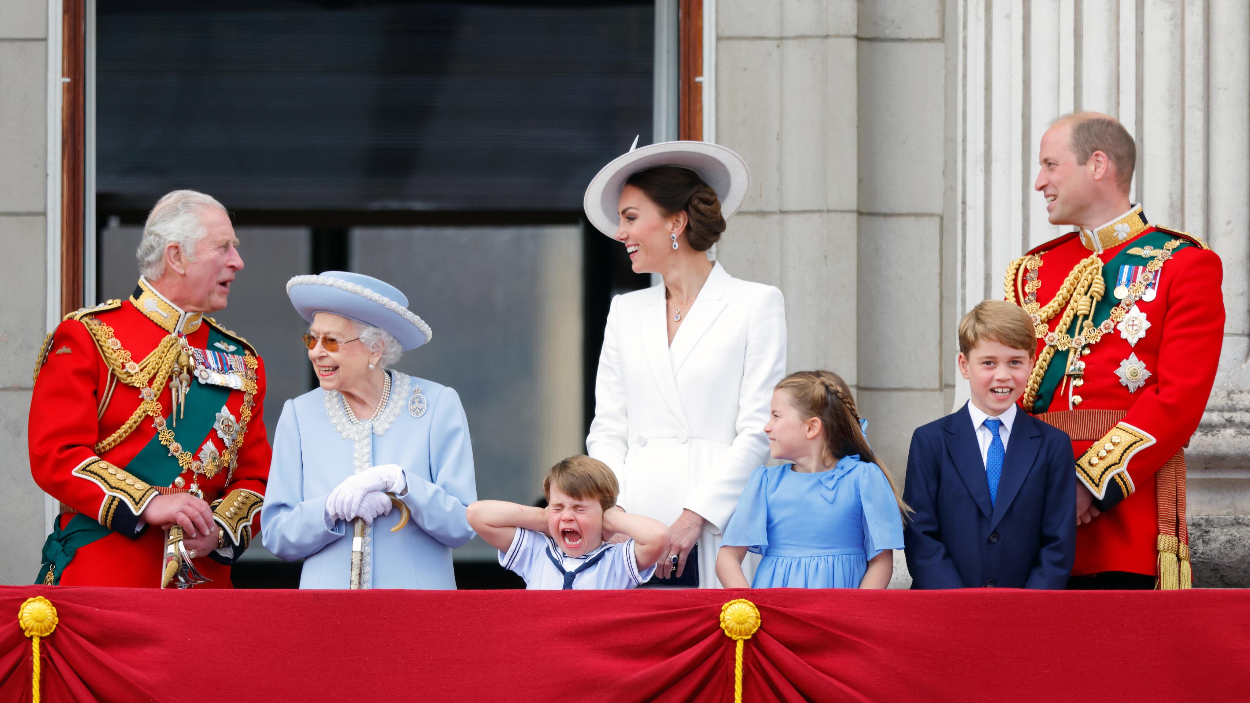 King Charles, Queen Elizabeth II, Prince Louis, Catherine, Princess of Wales, Princess Charlotte, Prince George and Prince William watch a flypast from the balcony of Buckingham Palace during Trooping the Colour on June 2, 2022