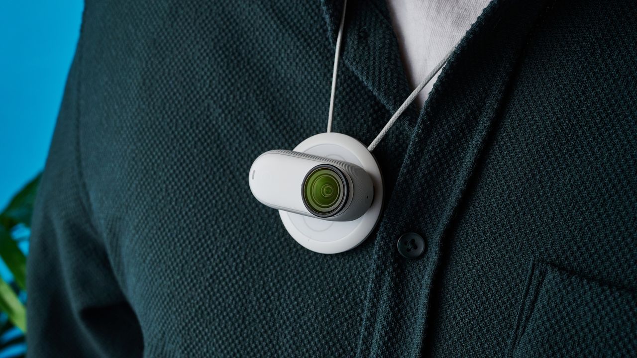 A photo of the Insta360 Go 3S on its magnetic neck pendant.