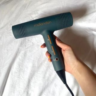 Original image showing handheld view of the mdlondon Blow Professional Hair Dryer