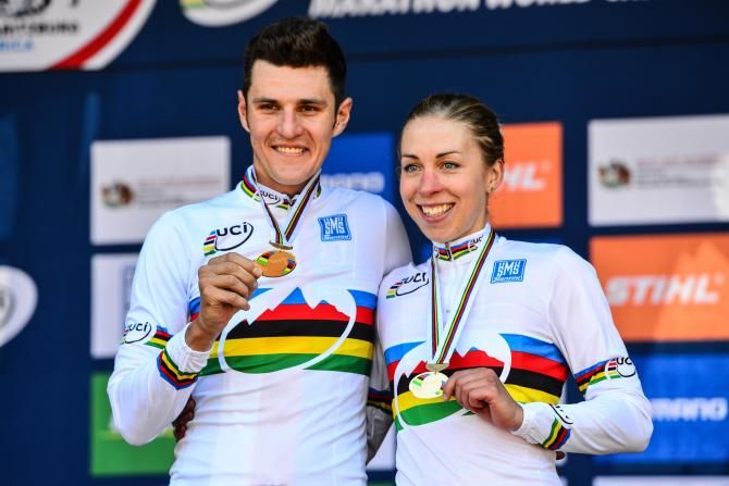Having tackled the tough Cascades MTB Park marathon track and held off all of the competitors men's winner Jaroslav Kulhavy (left) and Annika Langvad (right) show off their rainbow striped jersey's and gold medals at the 2014 UCI MTB Marathon World Championships in Pietermaritzburg on Sunday.