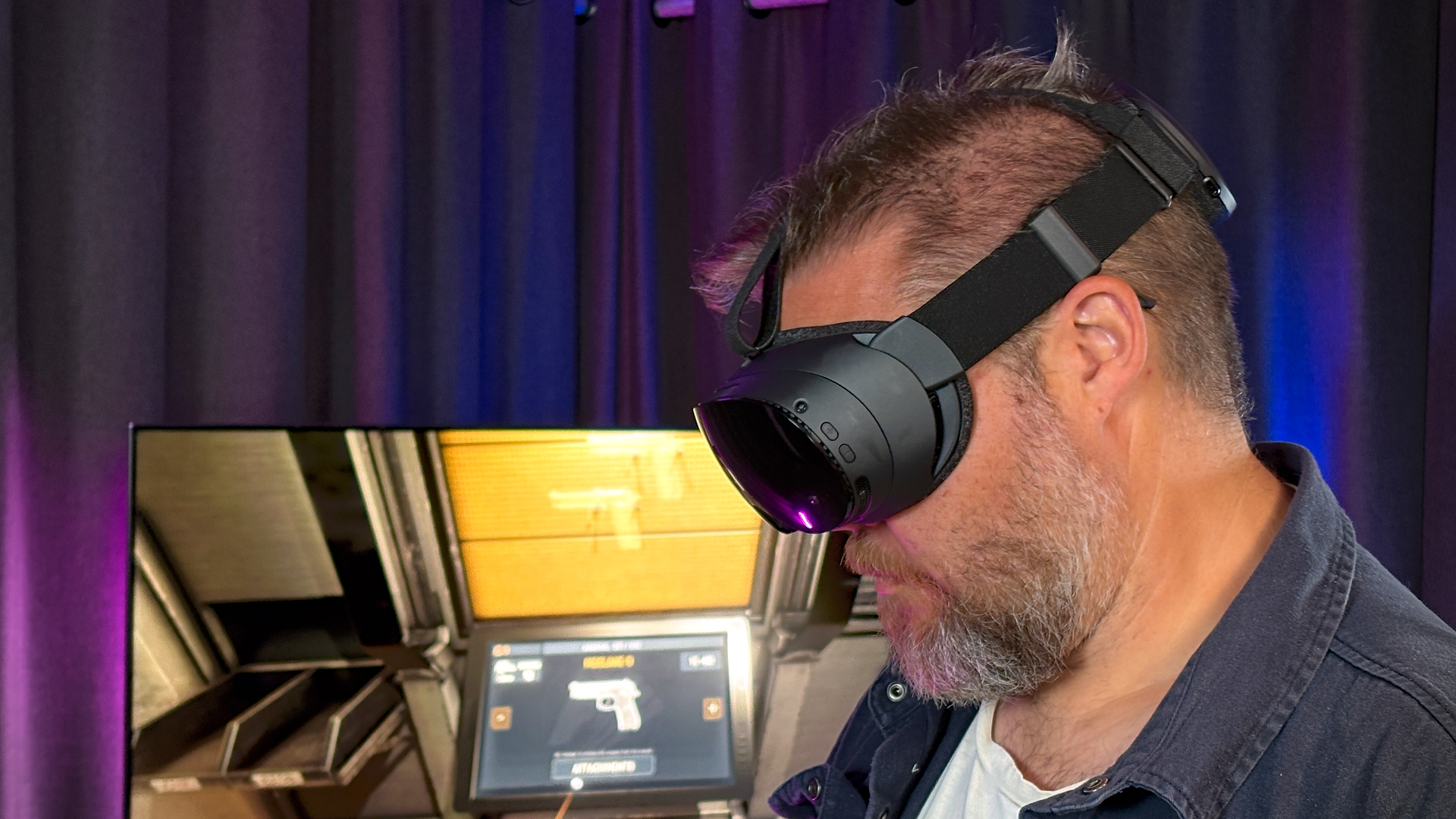 Dave James, PC Gamer EIC for Hardware, wearing the Steam Frame while playing a game in VR.