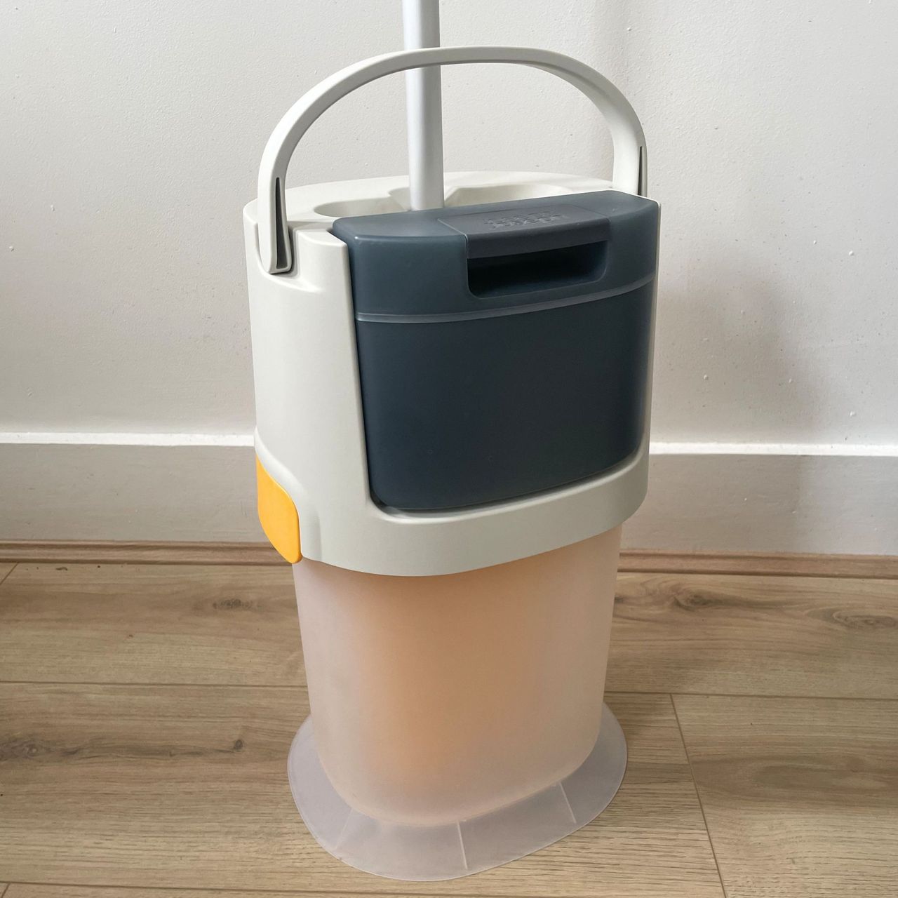 Joseph Joseph UltraClean Microfibre Floor Mop sitting on wood-effect flooring in front of a white background