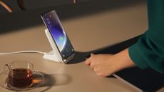 Oppo Find X5 Pro review: phone charging wirelessly on a desk