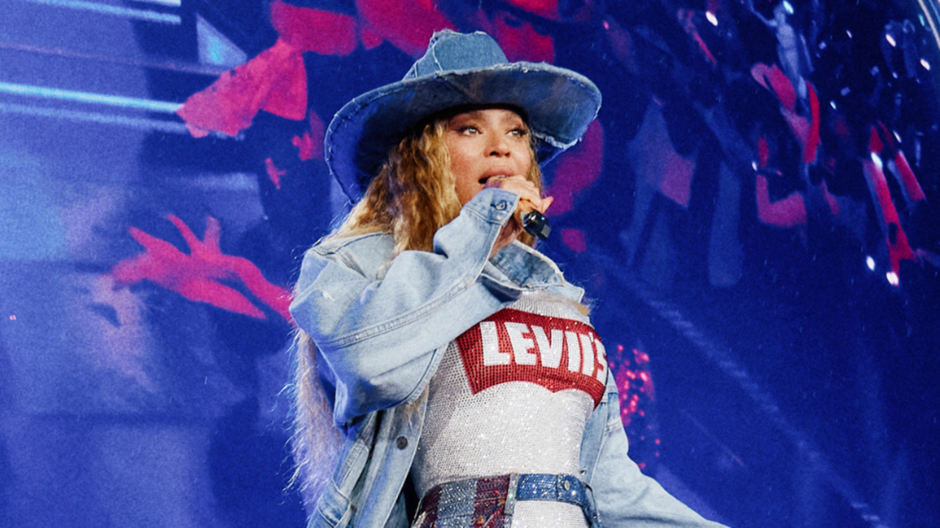 Beyoncé takes center stage at the 'Cowboy Carter' concert in a custom denim Levi's look.