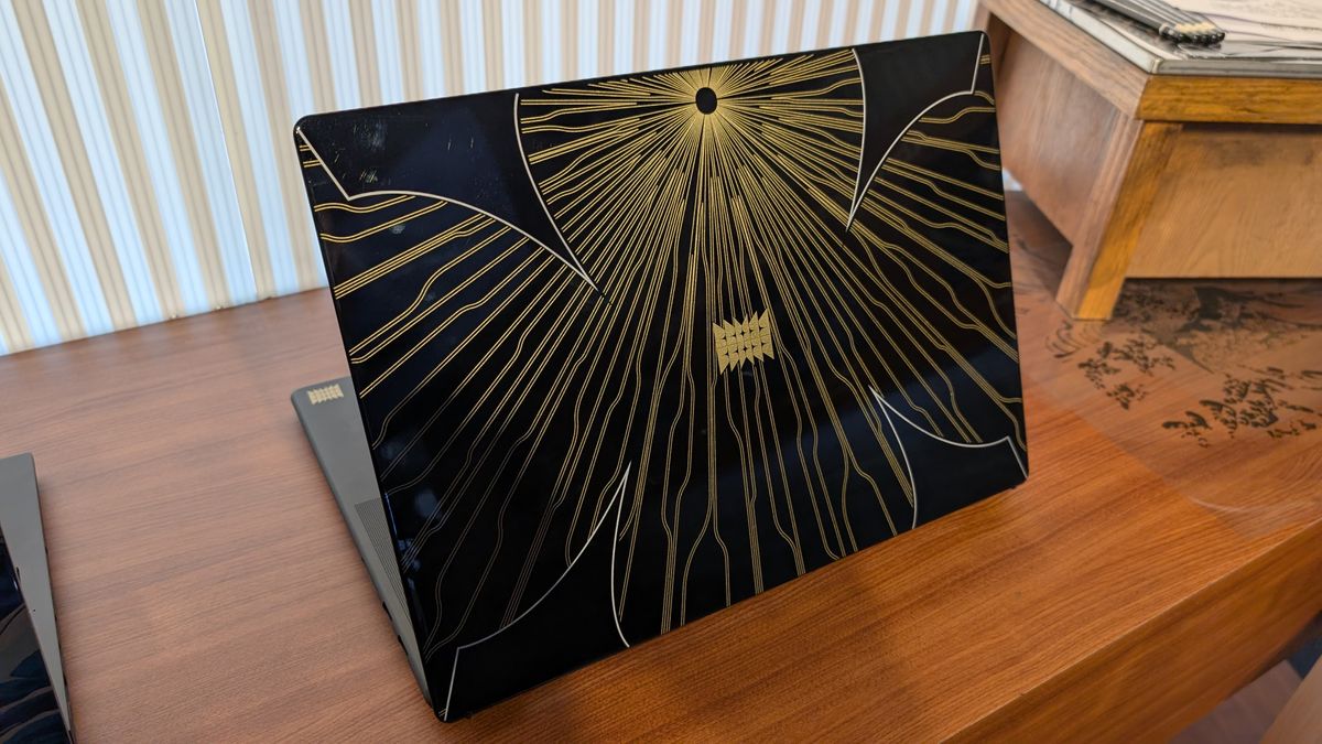 MSI Prestige 13 laptop with artwork at Computex 2025