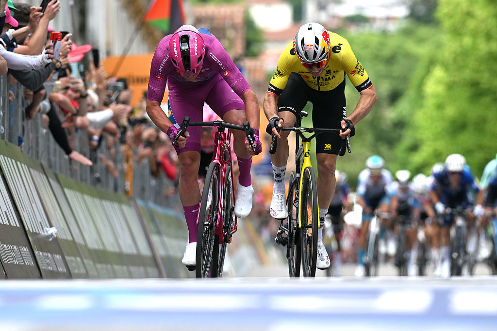 VICENZA ITALY MAY 23 LR Mads Pedersen of Denmark and Team Lidl Trek Purple Points Jersey and Wout Van Aert of Belgium and Team Visma Lease a Bike sprint at finish line to win the stage during the 108th Giro dItalia 2025 Stage 13 a 180km stage from Rovigo to Vicenza UCIWT on May 23 2025 in Vicenza Italy Photo by Dario BelingheriGetty Images