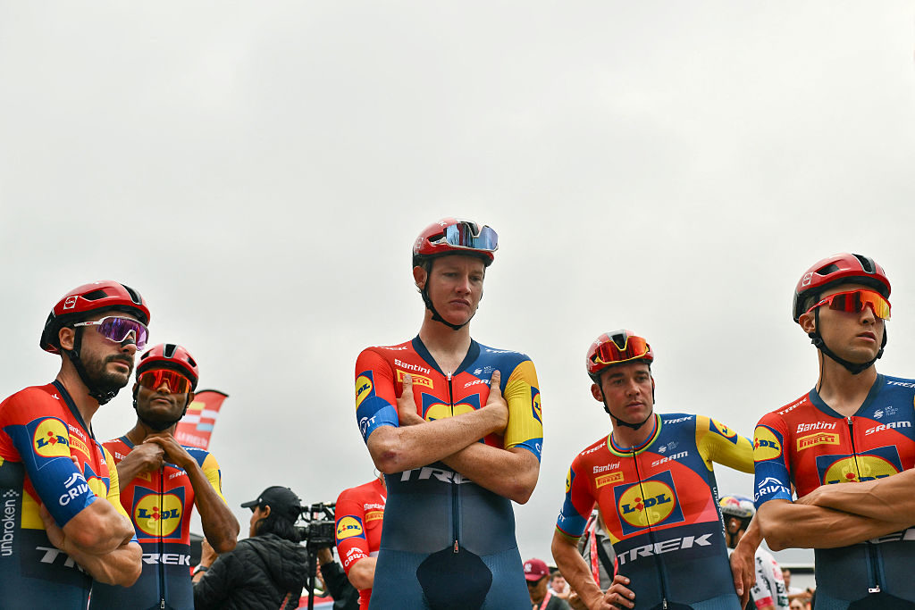 (From L) Team Lidl-Trek&#039;s French rider Julien Bernard, Team Lidl-Trek&#039;s Eritrean rider Amanuel Ghebreigzabhier, Team Lidl-Trek&#039;s Danish rider Mads Pedersen awaits the start of the second stage of the Vuelta a Espana, a 159,6 km race between Alba and Limone Piemonte, in Italy&#039;s Piemonte region, on August 24, 2025. (Photo by Marco BERTORELLO / AFP)