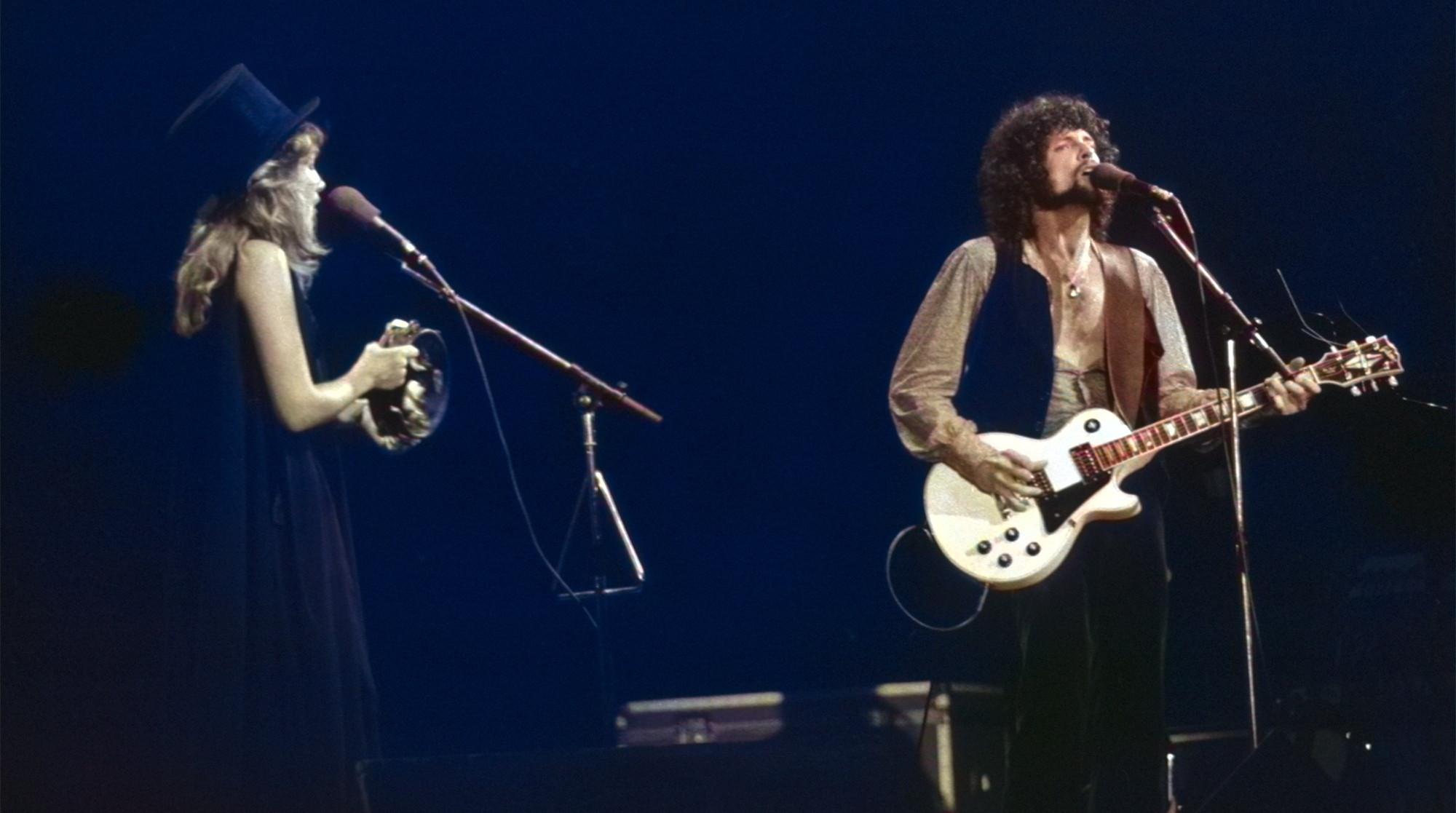 MAY 1977: Singer Stevie Nicks and guitarist Lindsey Buckingham of the rock group &#039;Fleetwood Mac&#039; perform onstage in May 1977.