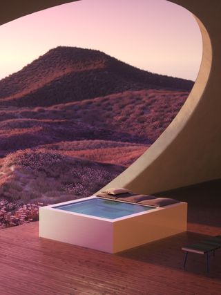 A square freestanding mini pool on a deck with a large oval window opening onto a hilly landscape