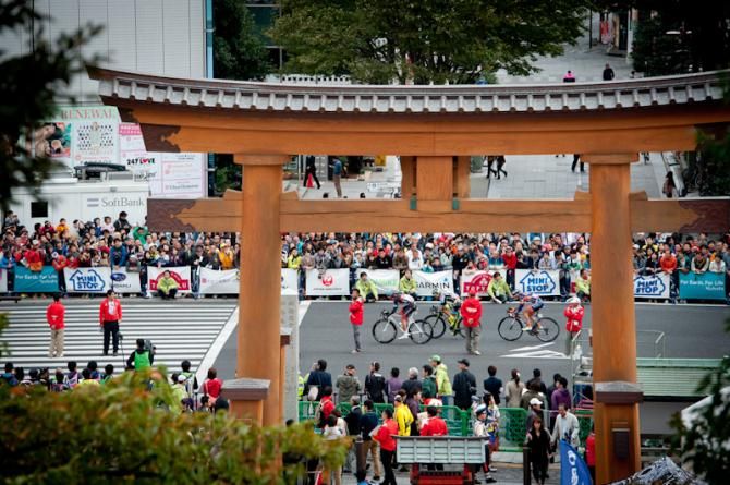 Riders pass through in front of Futaarayama shrine