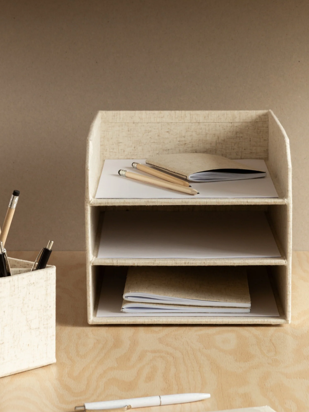 A cream desk organizer from Bigso Box of Sweden