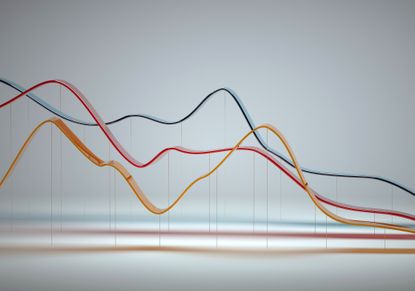 Digital generated image of abstract multi colored curve chart on white background