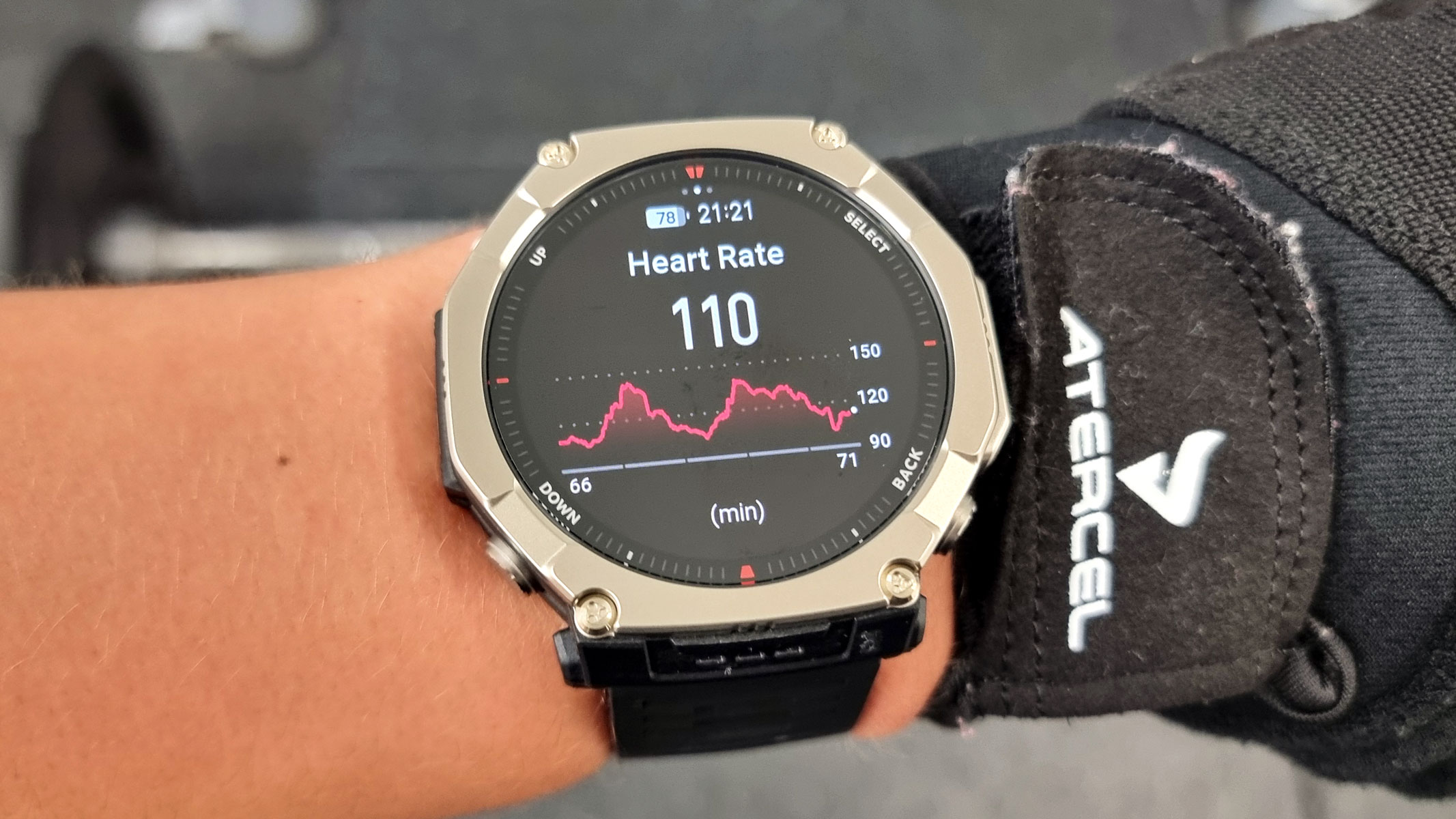 a close-up picture of our reviewer testing the Amazfit T-Rex Ultra 2 smartwatch in the gym