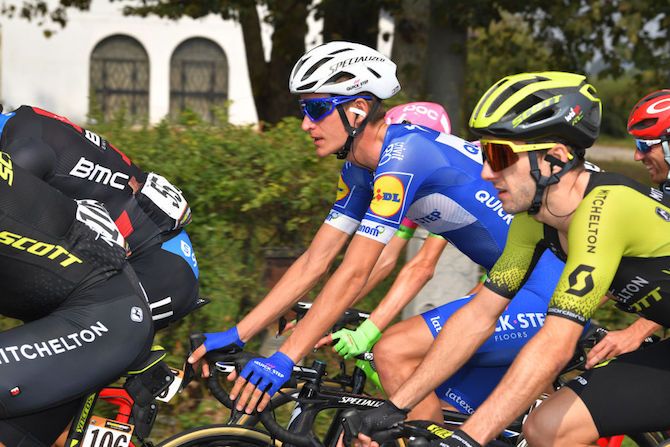 Quick-Step stagiaire Mikkel Honor&eacute; rides alongside Adam Yates (Mitchelton-Scott) at the 2018 Milano-Torino