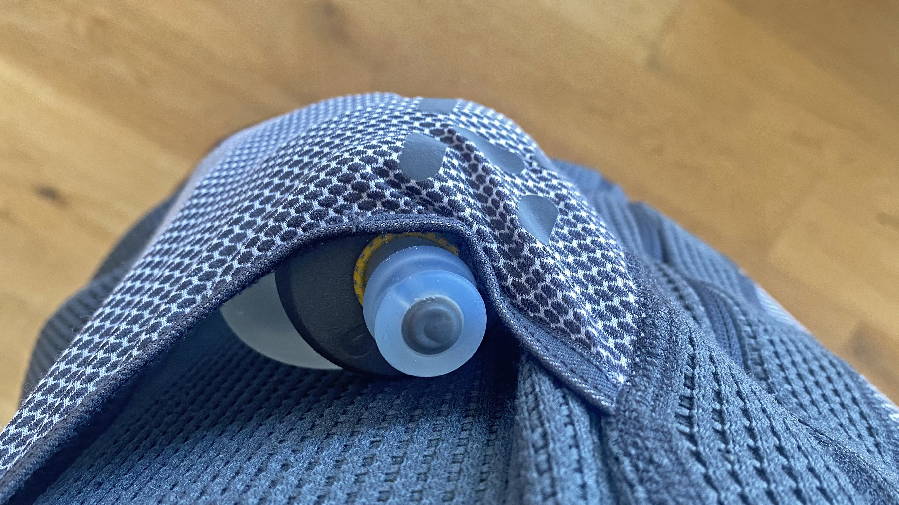 The Haglöfs L.I.M. ZT II Air Mid, shown with a flask in one of the chest pouches