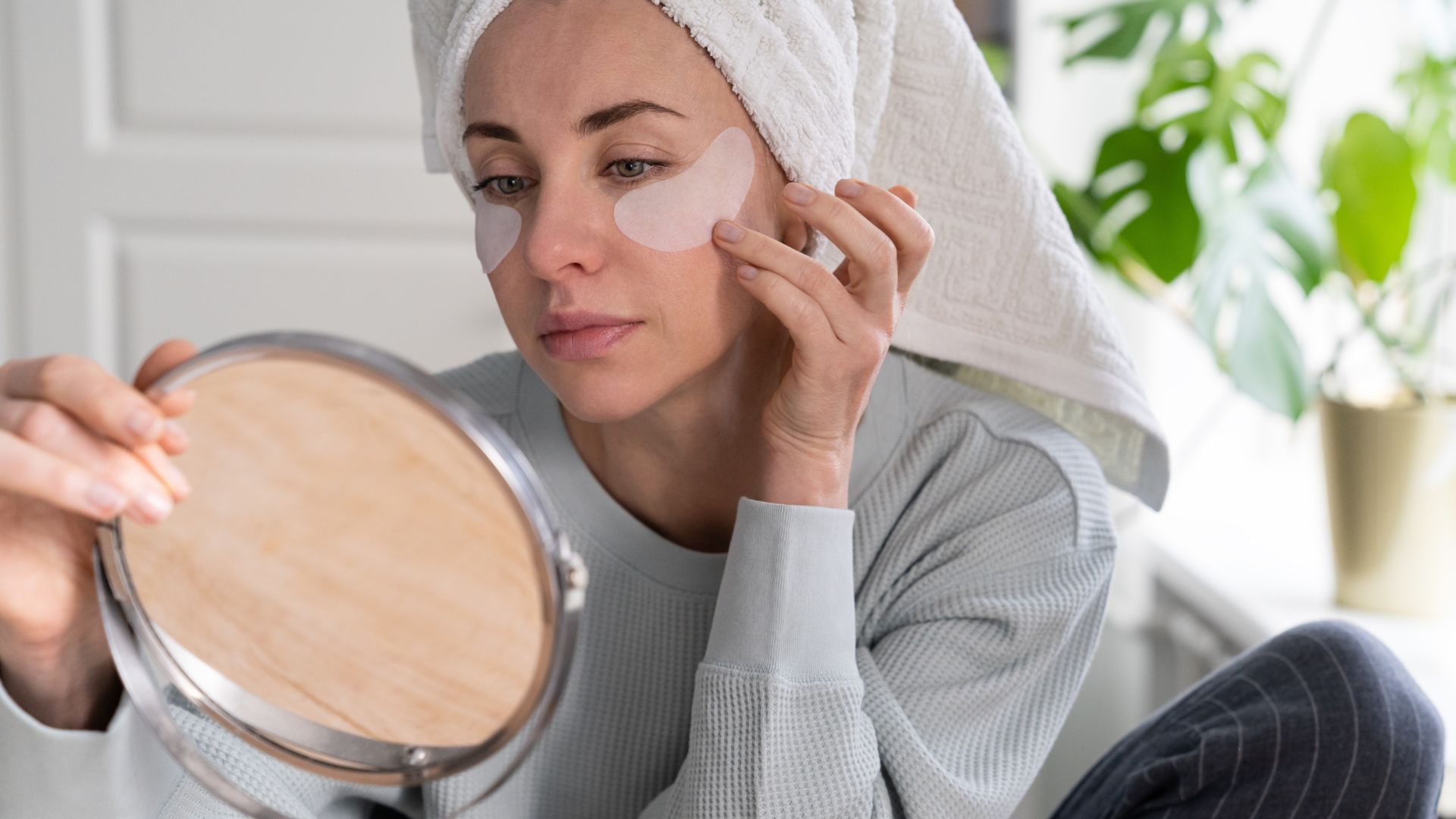 Woman using an eye mask