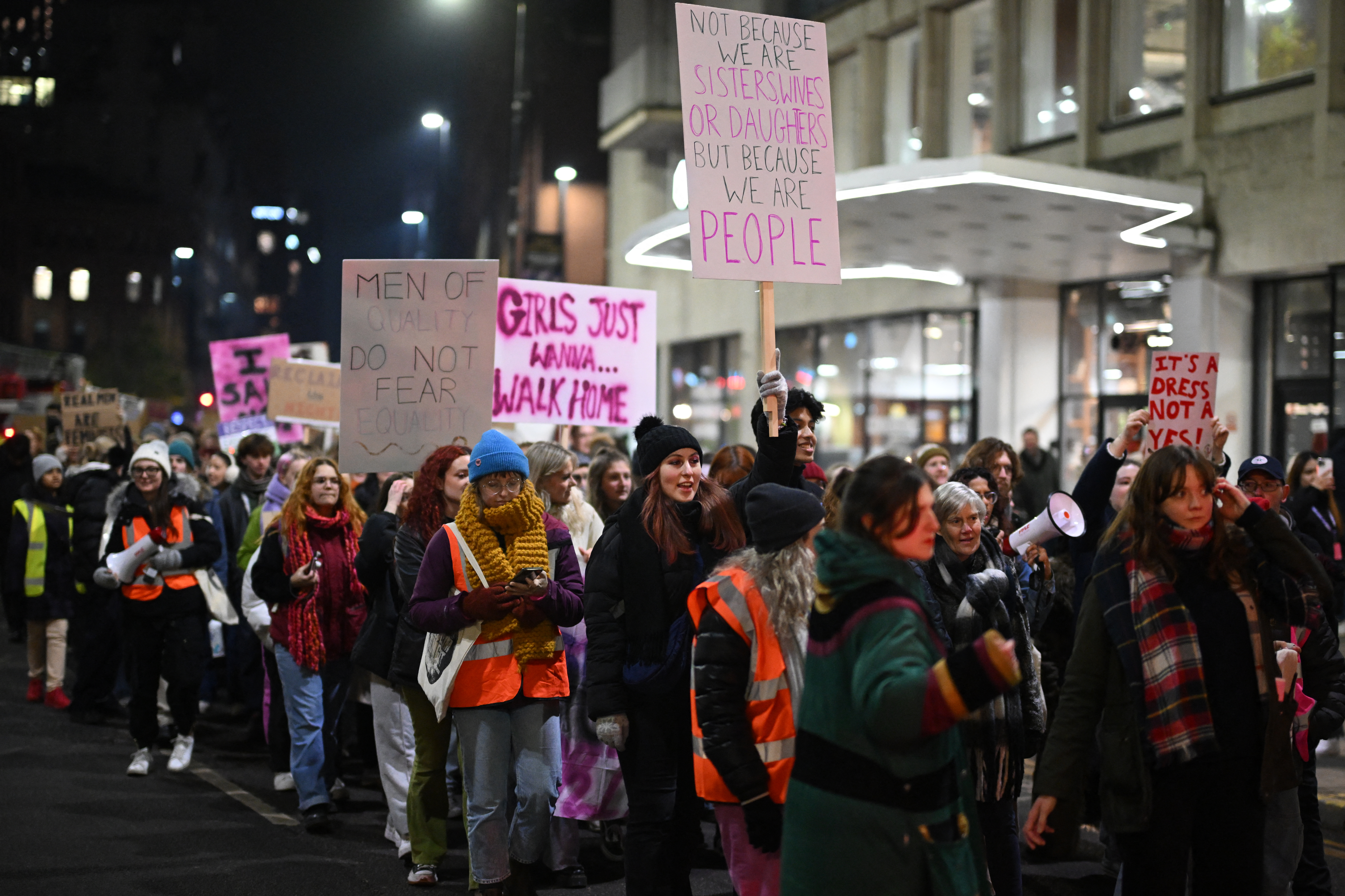 People attend an annual &#039;Reclaim the Night&#039; march, campaigning for an end to sexual harassment and gender-based violence, in Manchester in 2023.
