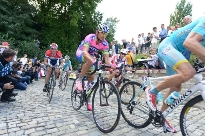 Pozzato follows Andriy Grivko's back wheel