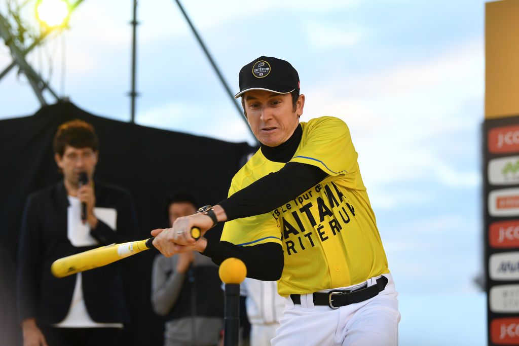 Geraint Thomas takes a swing
