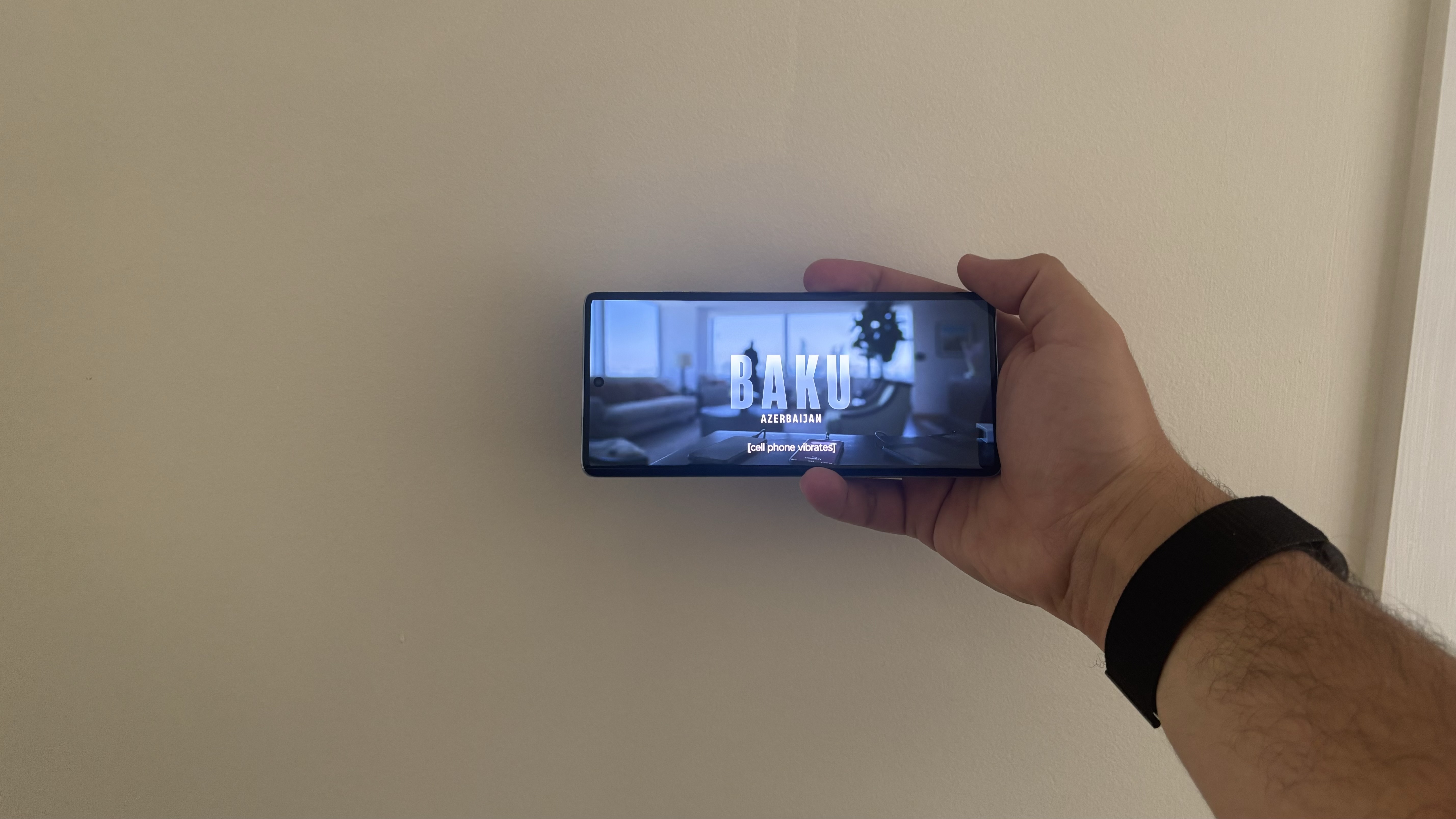 Motorola Edge 50 Fusion being held while playing a movie