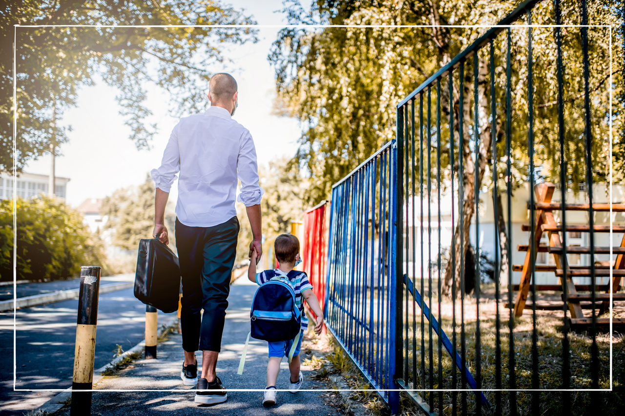 Father walking son to school