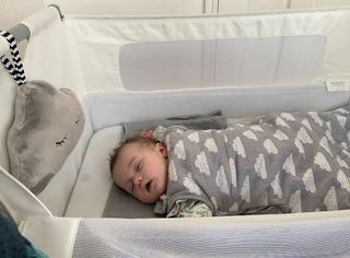 Our tester's baby, Freddie, pictured asleep in the Snuzpod 4 during testing.