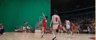 Basketball players competing against a greenscreen