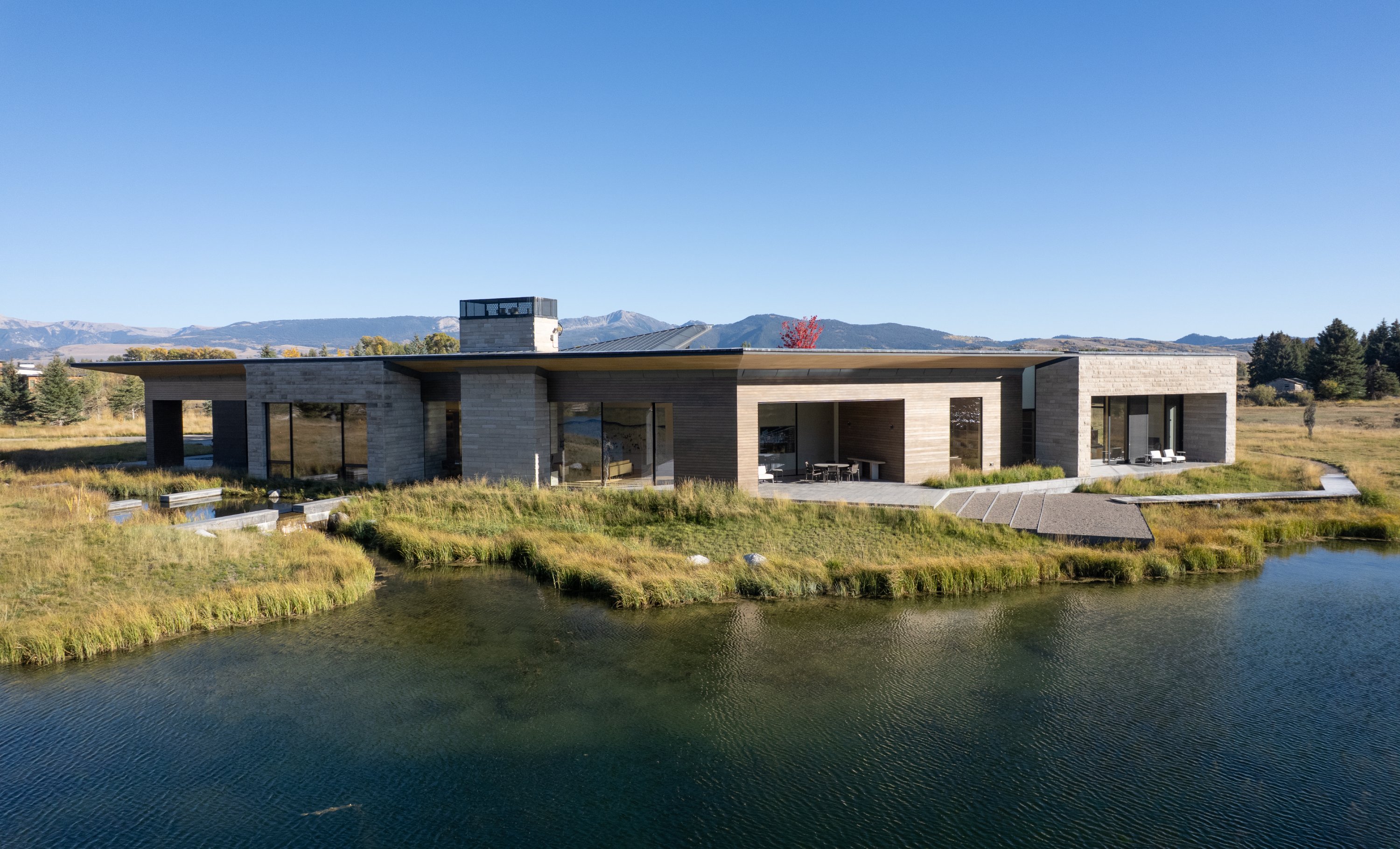 The main house is on the water's edge