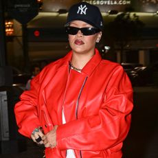 Rihanna ran errands in L.A. while wearing a red leather bomber jacket and python pumps