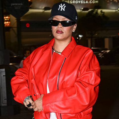 Rihanna ran errands in L.A. while wearing a red leather bomber jacket and python pumps