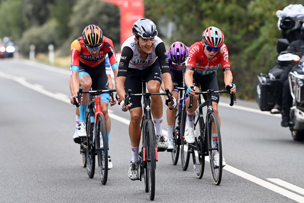 GUADARRAMA SPAIN SEPTEMBER 16 LR Wout Poels of The Netherlands and Team Bahrain Victorious Marc Soler of Spain and UAE Team Emirates Pelayo Sanchez Mayo of Spain and Team BurgosBH and Lennert Van Eetvelt of Belgium and Team Lotto Dstny compete in the breakaway during the 78th Tour of Spain 2023 Stage 20 a 2078km stage from Manzanares El Real to Guadarrama UCIWT on September 16 2023 in Guadarrama Spain Photo by Tim de WaeleGetty Images