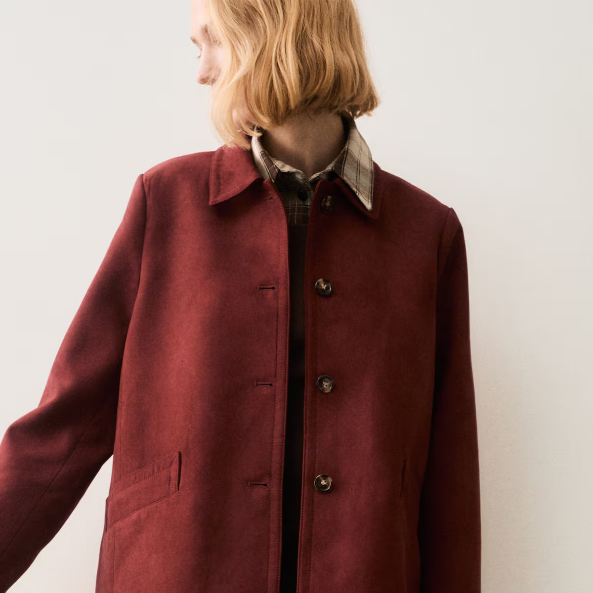 Photo of model wearing red suede H&M jacket.