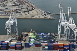A giant barge wrapped in the key art featuring Call of Duty operator Ghost docks with a port in Long Beach.