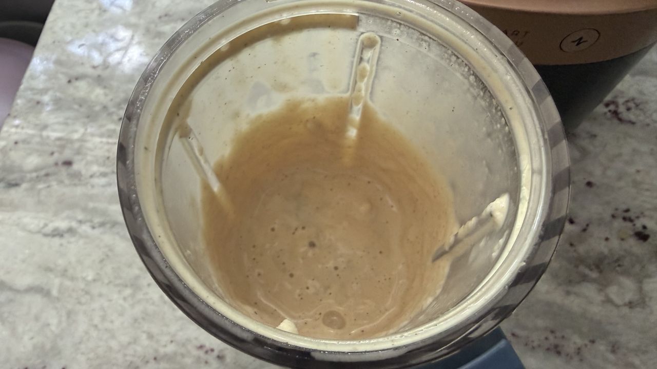 Ninja CrushBOSS making banana peanut butter smoothie