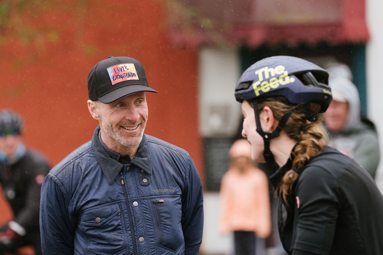 Race founder Levi Leipheimer congratulates Lauren De Crescenzo on her win