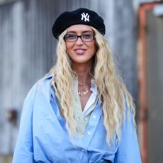 street style shot of blonde woman with wavy hair