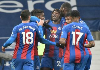 Crystal Palace’s Wilfried Zaha (2nd left) celebrates with his team-mates after scoring his side’s fourth goal of the game during the Premier League match at The Hawthorns, West Bromwich