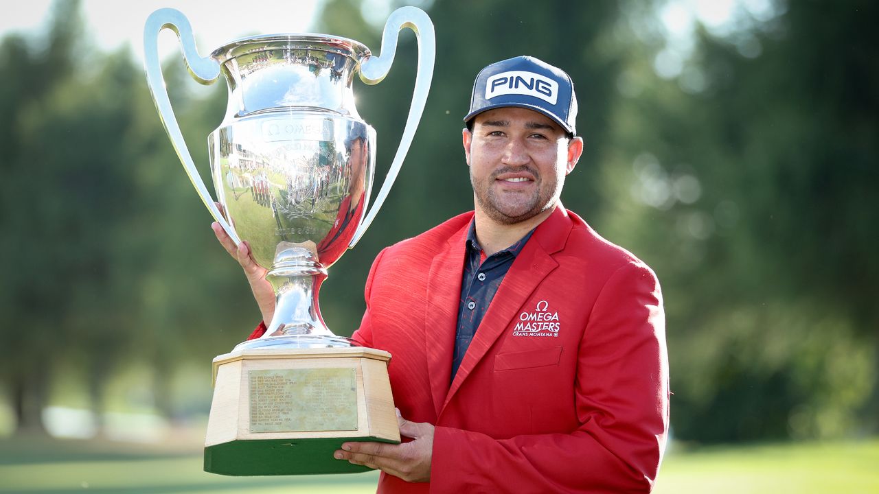 Thriston Lawrence with the trophy after winning the 2022 Omega European Masters