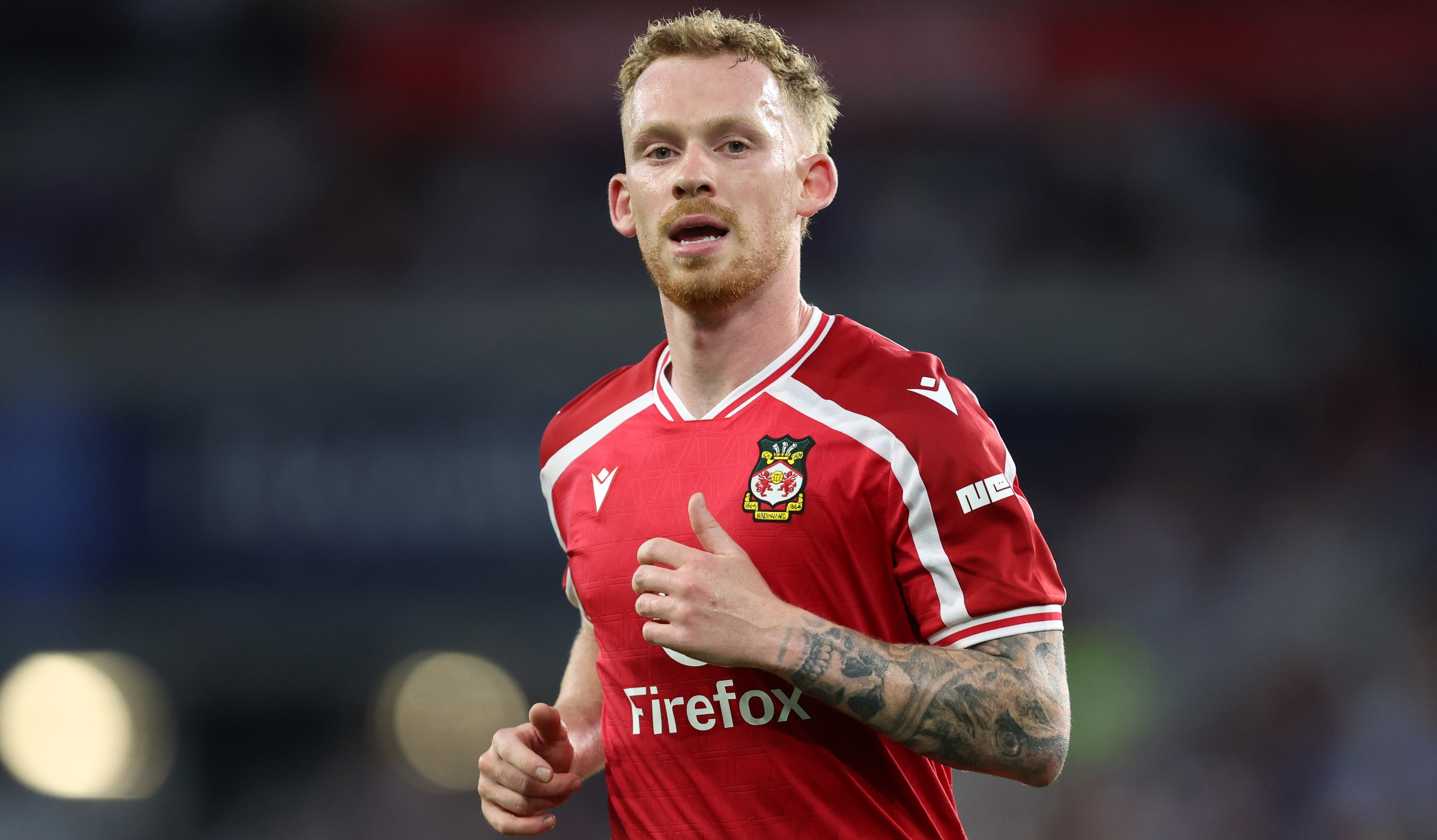 Lewis O'Brien of Wrexham during the Sky Bet Championship 2026/27 match between Cardiff City and Wrexham at Cardiff City Stadium on August 17, 2026 in Cardiff, Wales