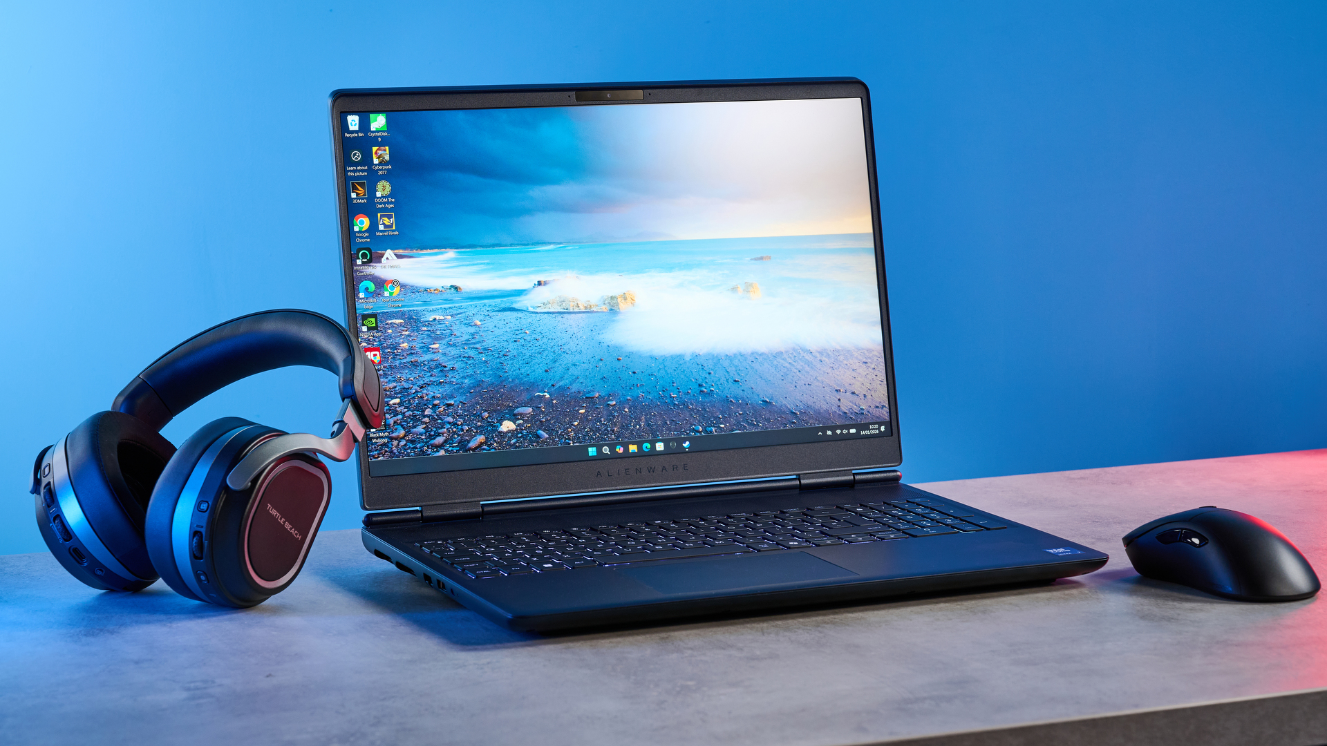 A blue Alienware 16X Aurora gaming laptop