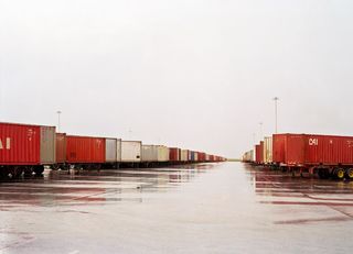 A lorry container park with trailers on either side.