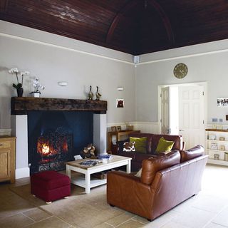 living room leather sofa with fire place
