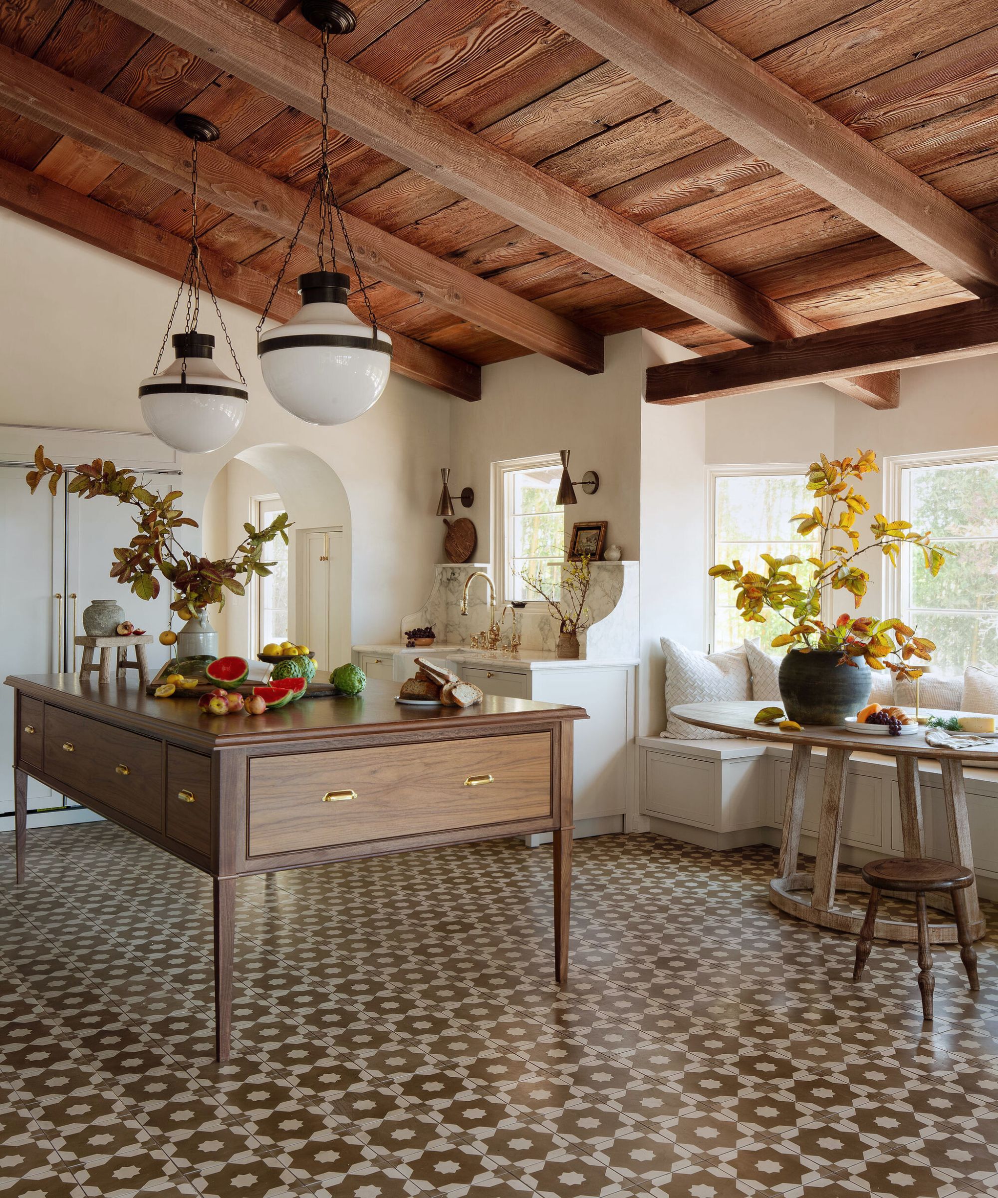 kitchen project with brown tiled feature floor and a wooden kitchen table island