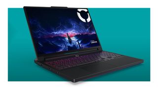 The Lenovo Legion Pro 7i Gen 10 gaming laptop on a teal deals background, with its keyboard lit in pink