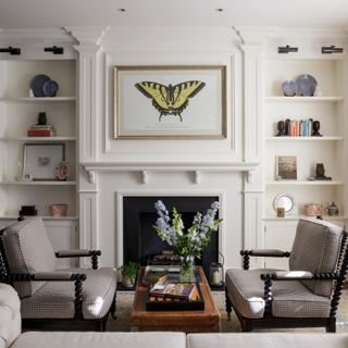 cozy living room with black and white accent chairs