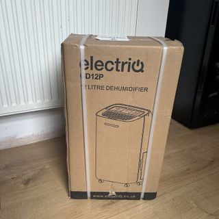 The ElectriQ 12L dehumidifier in its outer packaging