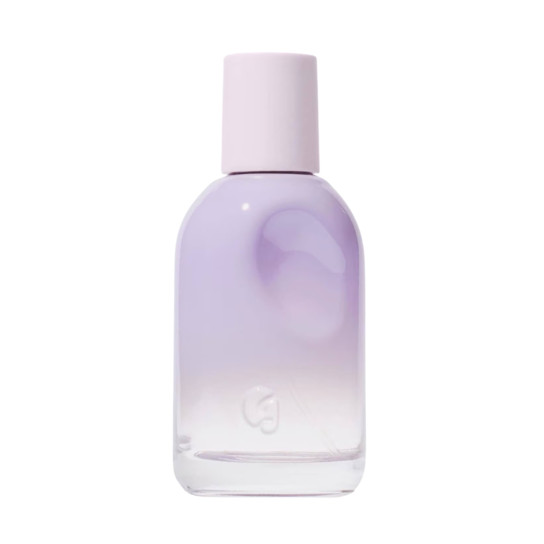 A product shot of GLOSSIER You Fleur - Eau de Parfum, which features a pastel purple glass bottle, on a white background